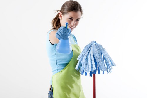 Carpet cleaner preparing equipment in a safe working environment